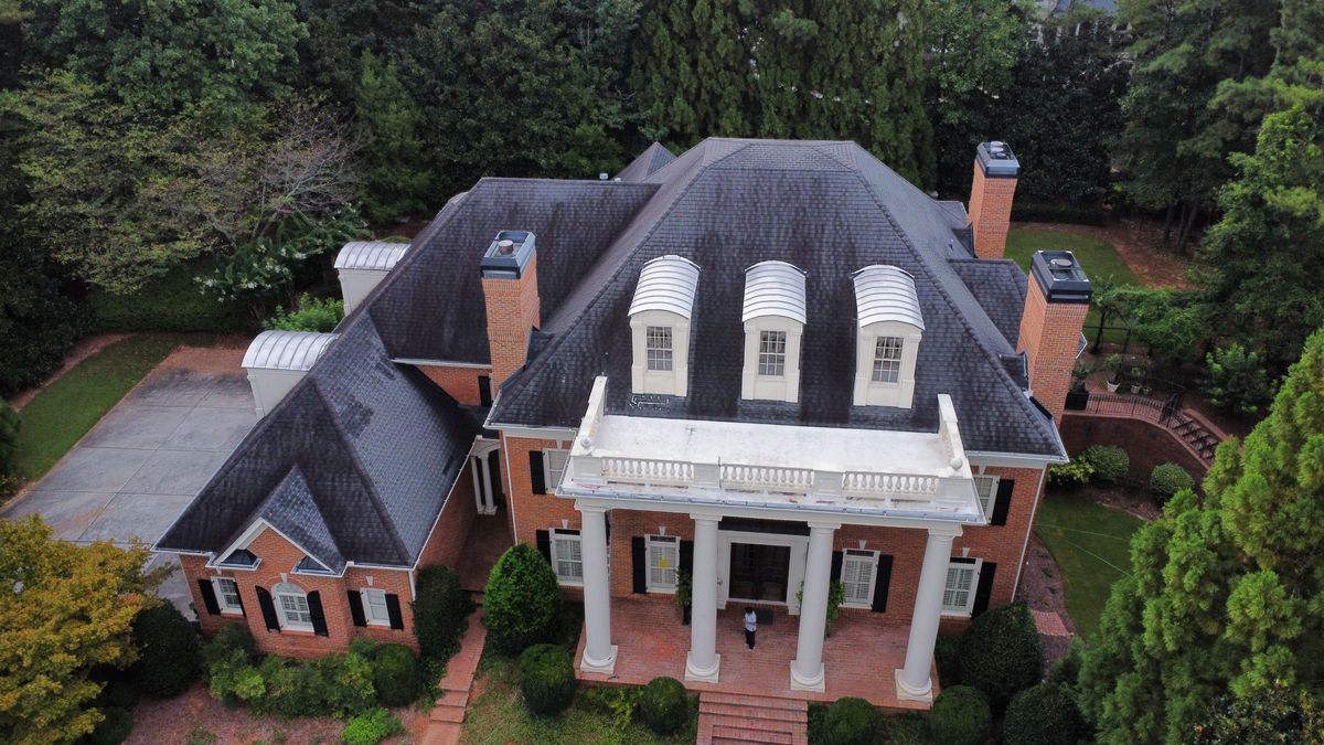 Front drone view of home before CertainTeed Landmark Pro Moire Black roof replacement